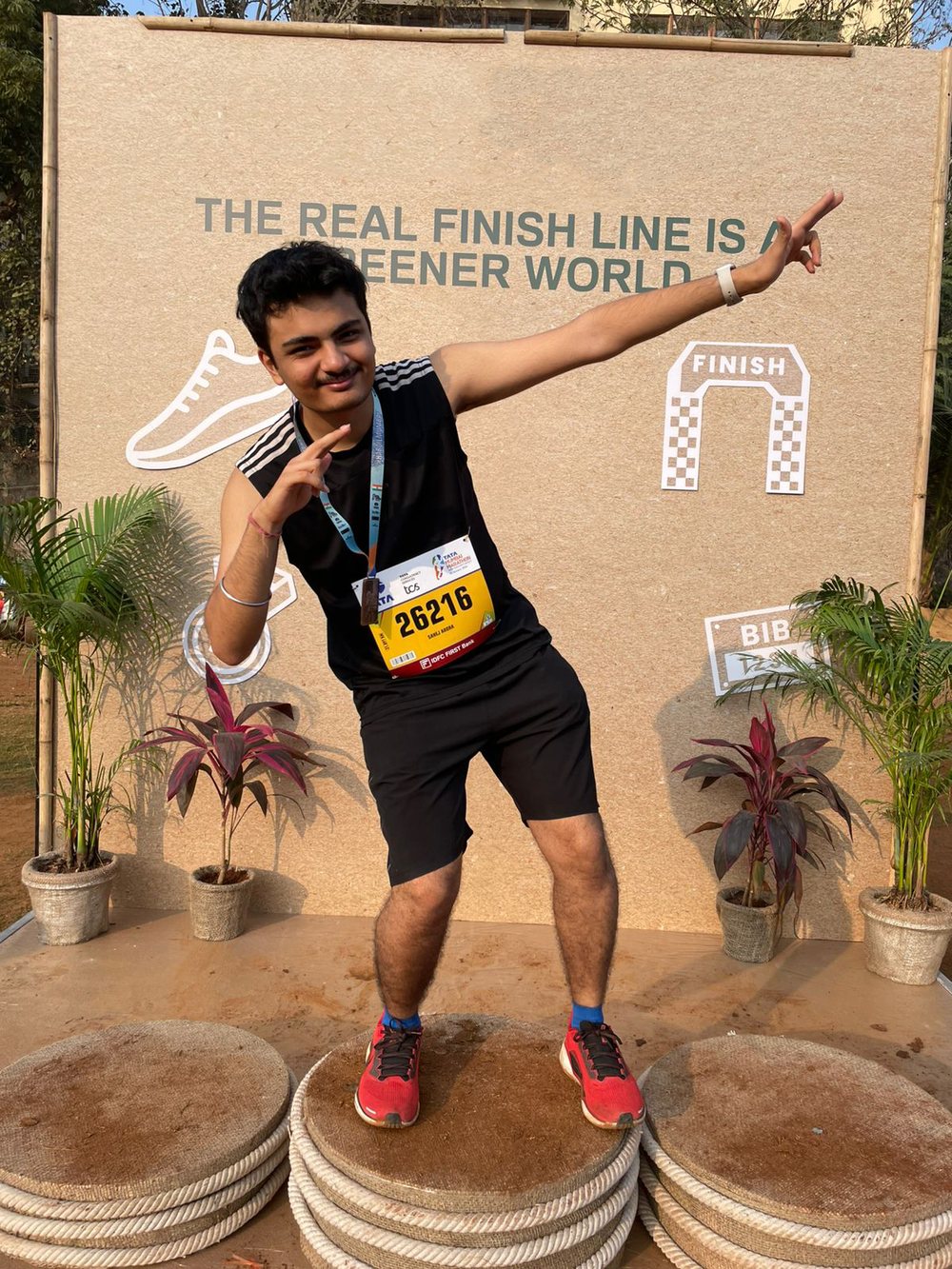Sahej with his medal after a race