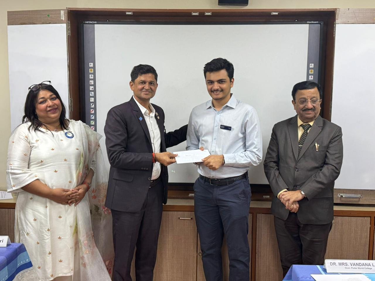 Sahej receiving an award